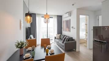 Apartamento, 1 quarto, sacada, vista para a cidade | Área de estar