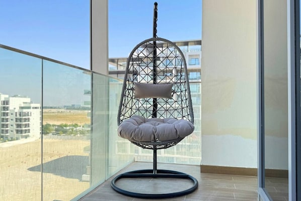 A peaceful balcony retreat offering tranquility and stunning scenery.