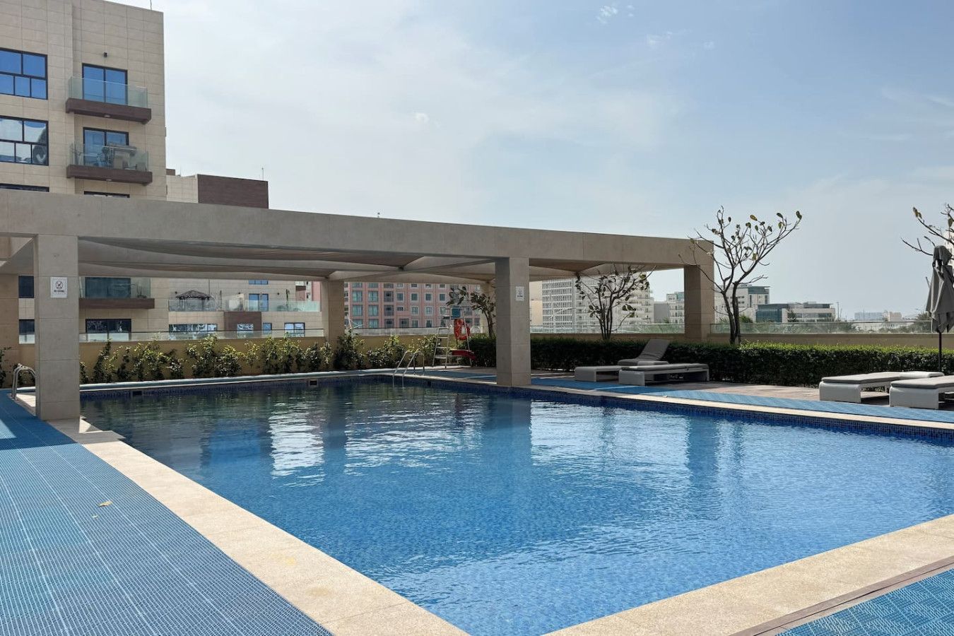 Take a dip and soak up the sun in a serene outdoor pool.