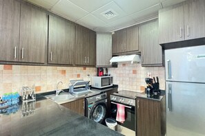 Your culinary haven awaits! Discover our fully-equipped kitchen with all the essentials.