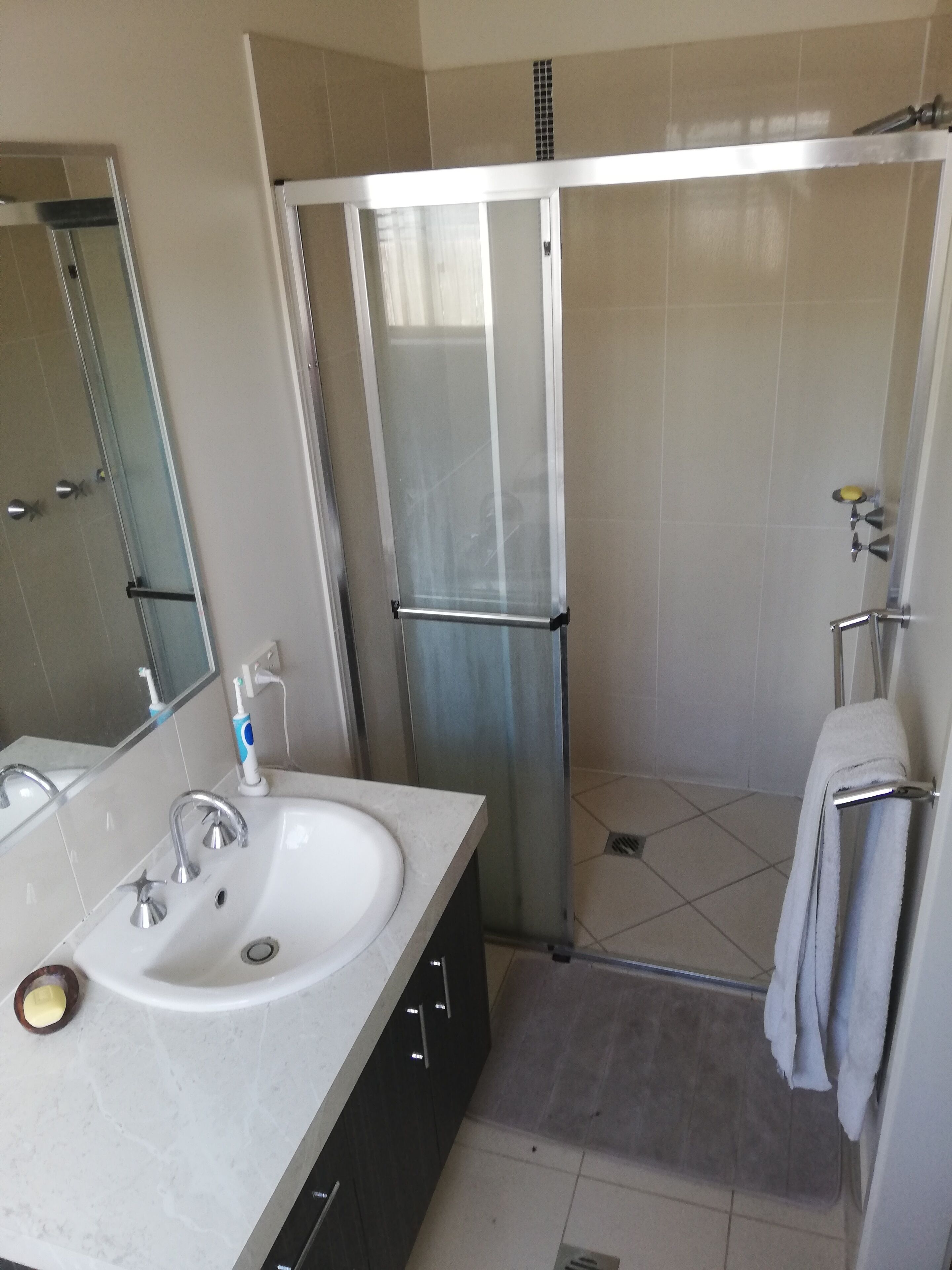 Shower, hair dryer, towels, soap