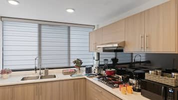 Fridge, microwave, stovetop, coffee/tea maker