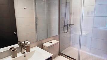 Hair dryer, towels, soap, toilet paper
