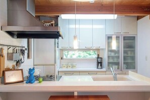 Fridge, microwave, stovetop, cookware/dishes/utensils