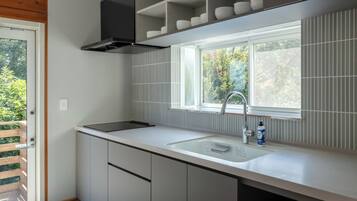 Fridge, microwave, cookware/dishes/utensils