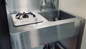 A stainless steel kitchen with a gas stove, sink, and a soap dispenser. - 15min Shinjuku/5min Hatsudai(OperaCityDirect).Quiet,perfect place/Early check-in (Shinjuku City)