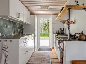 Fridge, microwave, toaster, cookware/dishes/utensils - Klägghult by Interhome (Kalv)