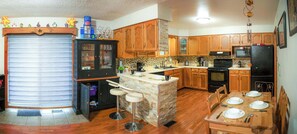 Fridge, microwave, oven, stovetop - Petals Suite | Cozy Retreat Pool & Forested Views! (HERS)