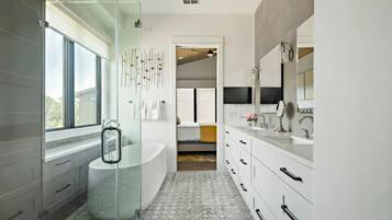 Shower, hair dryer, towels, shampoo