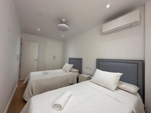 Een strijkplank/strijkijzer, gratis wifi, beddengoed