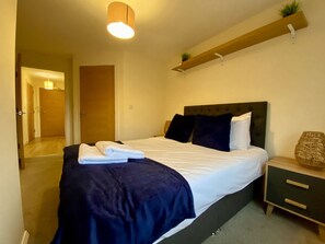 2 dormitorios, tabla de planchar con plancha, wifi gratis y ropa de cama