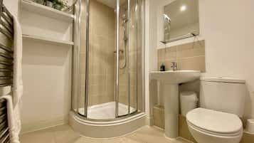 Shower, hair dryer, towels