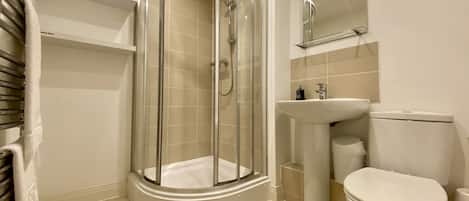Shower, hair dryer, towels