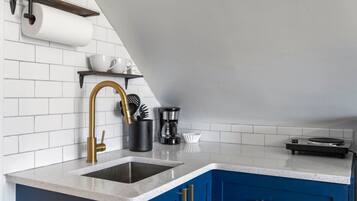 Fridge, microwave, coffee/tea maker, toaster