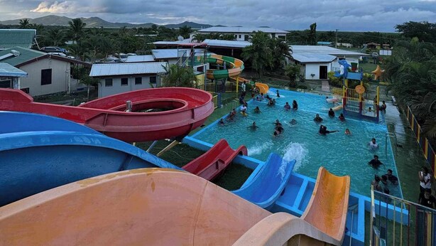 A water park with multiple slides and a swimming pool. - Tavua Hotel (Tavua)