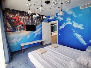 A bedroom with a mural of a cityscape and clouds, a bed, a bench, and a wardrobe. - Eco Therma Village Spa & Sport (Balchik)