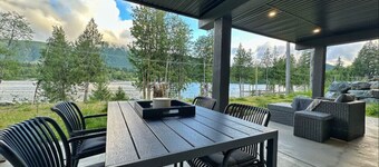 Modern Lakefront Retreat with Private Sauna & Scenic Views