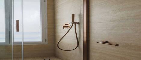 Shower, hair dryer, towels