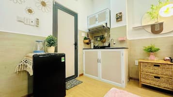 Estudio superior | Cocina privada | Frigobar, parrilla de estufa y utensilios de cocina