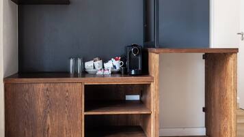 Family Quadruple Room, Patio, Garden View | Living area | 32-inch Smart TV with digital channels, Netflix, streaming services