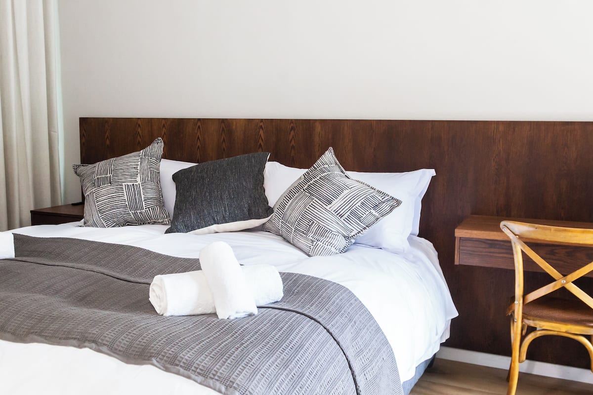 Family Quadruple Room, Patio, Garden View | In-room safe, desk, soundproofing, iron/ironing board