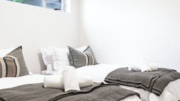 Family Quadruple Room, Patio, Garden View | In-room safe, desk, soundproofing, iron/ironing board