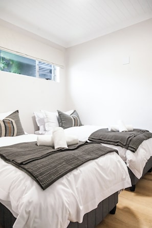 Family Quadruple Room, Patio, Garden View | In-room safe, desk, soundproofing, iron/ironing board