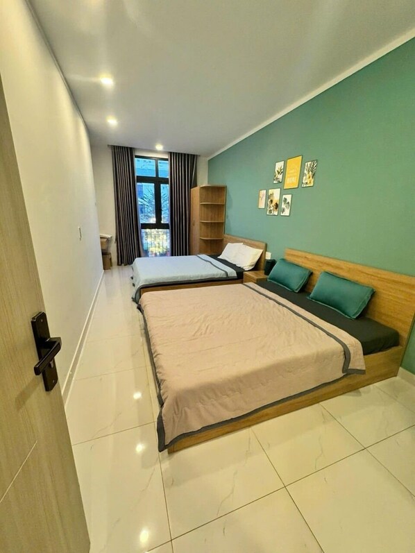 Chambre Standard double ou avec lits jumeaux, vue sur la ville | Rideaux dâobscurcissement, accĂšs au Wi-Fi (inclus), literie fournie