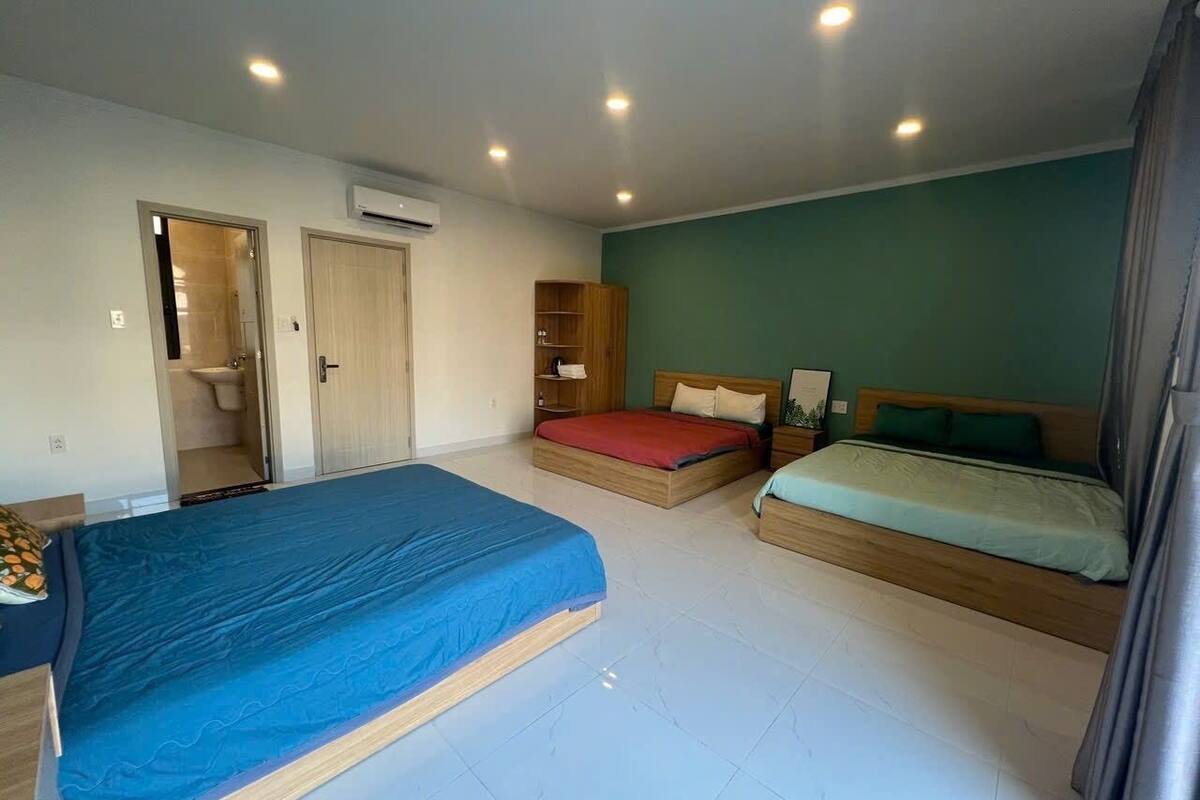 Family Triple Room, Balcony, City View | Blackout drapes, WiFi (free), bed sheets