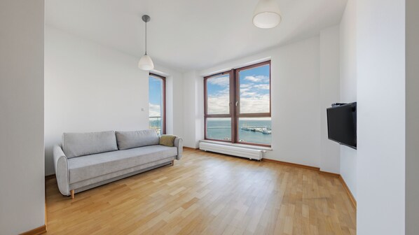 Apartment (133) | Living area | Flat-screen TV - Apartamenty Sun & Snow Sea Towers (Gdynia)