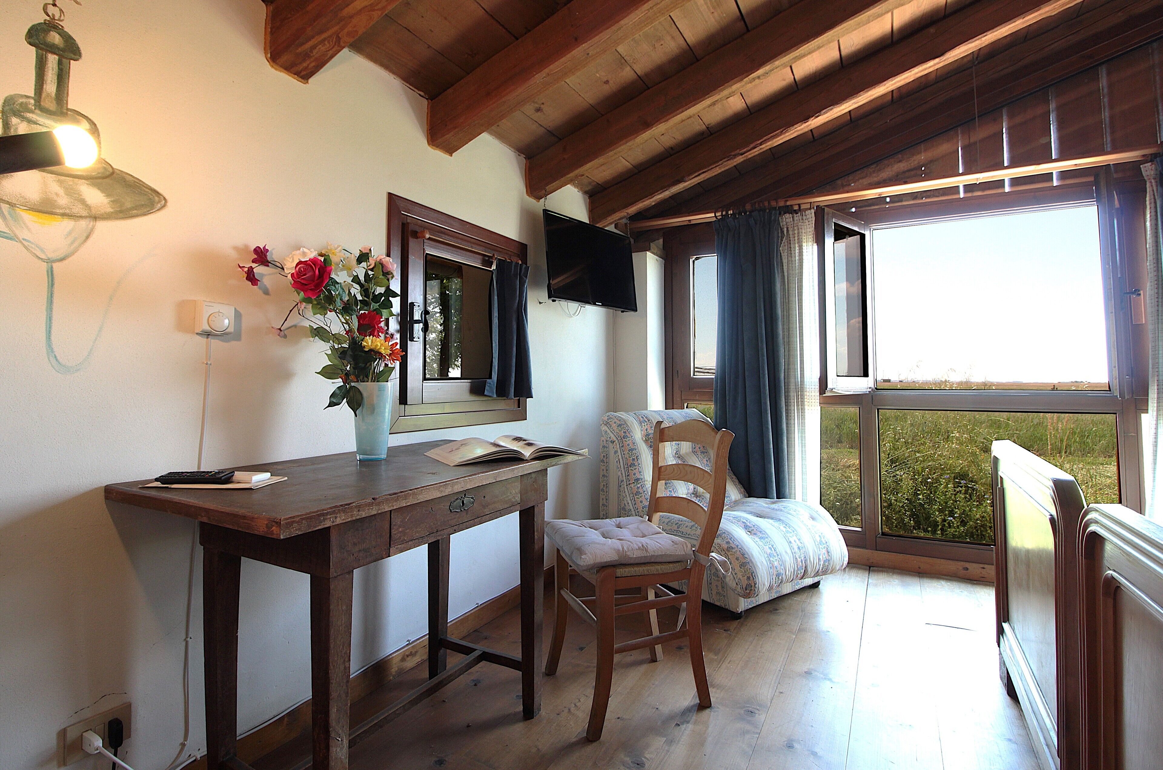 Desk, blackout curtains, iron/ironing board, free cots/infant beds