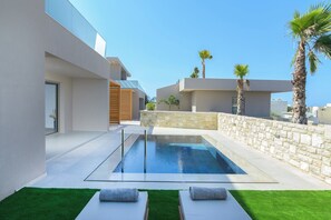 Outdoor pool, pool umbrellas, pool loungers