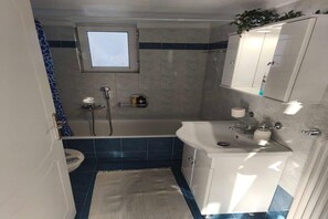 Hair dryer, towels, soap, toilet paper