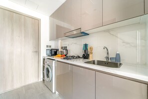 Fridge, microwave, toaster, cookware/dishes/utensils