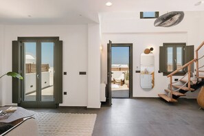Majestic Suite with Outdoor Hot Tub | Living area | TV - Acro Caldo Suites (Akrotiri)
