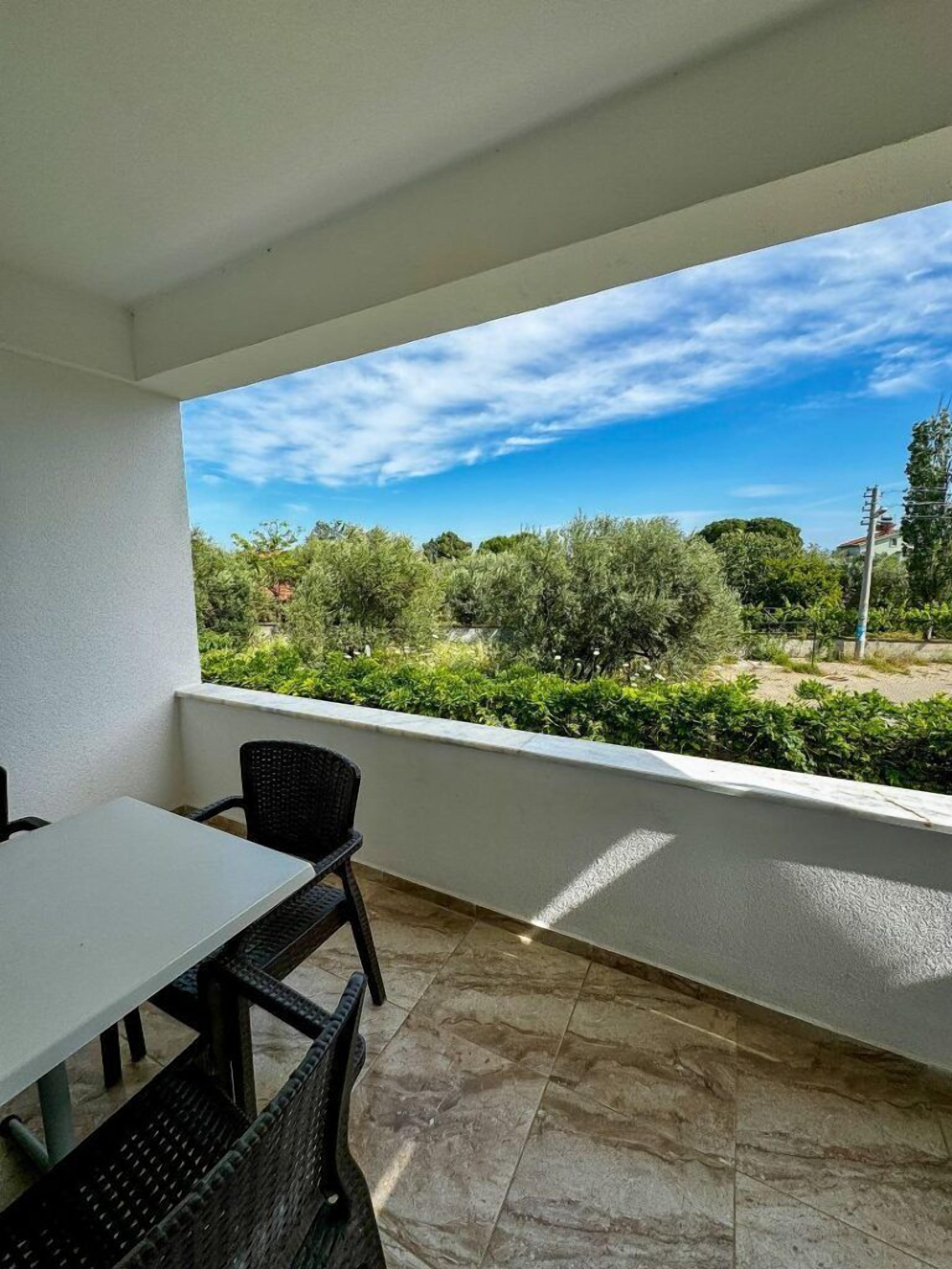 Triple Room, Balcony, Garden View | Laptop workspace, iron/ironing board (on request), WiFi (free)