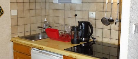 Microwave, stovetop, coffee/tea maker, toaster