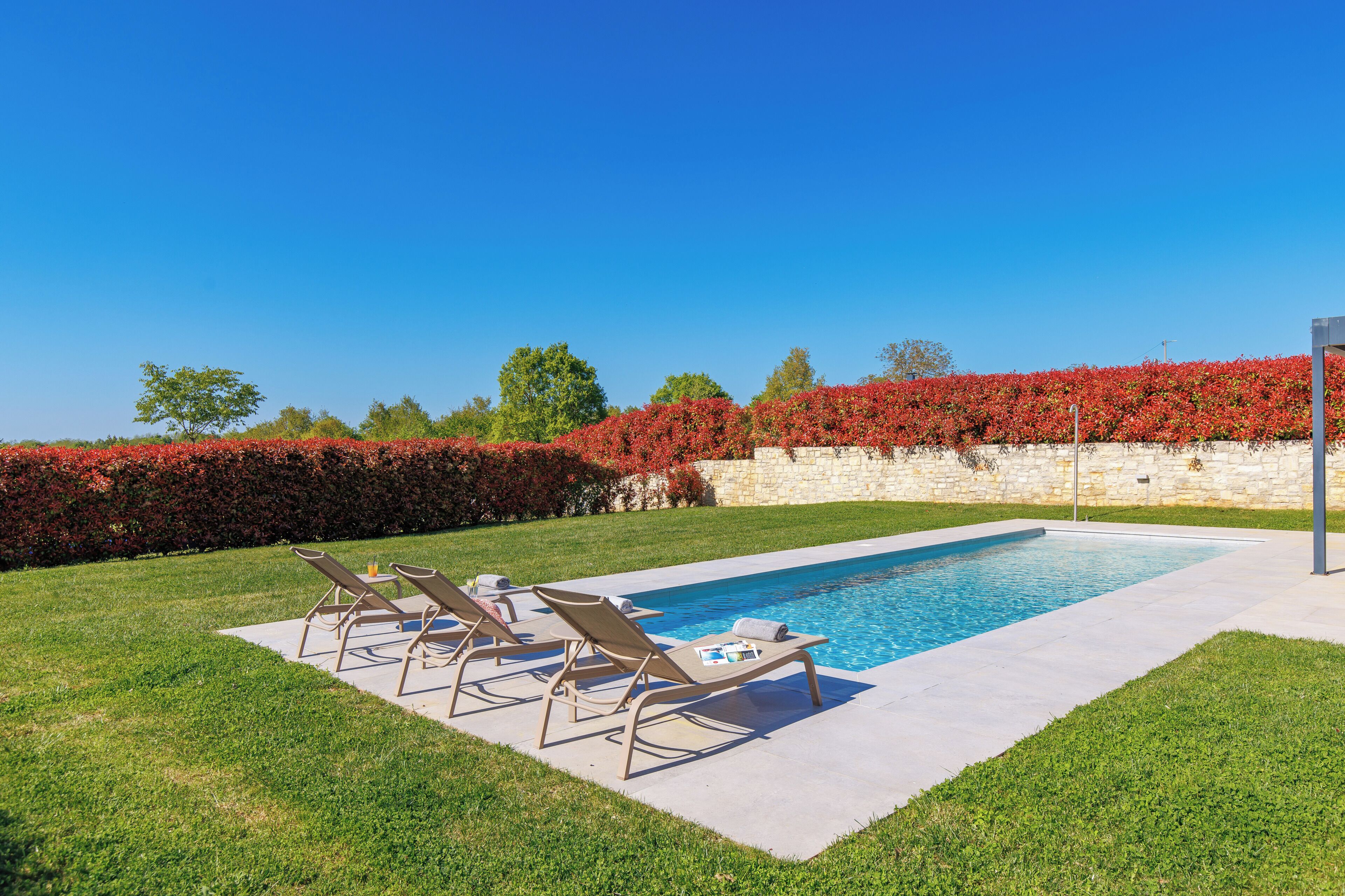 Outdoor pool, pool umbrellas, pool loungers