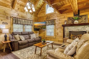 Älytelevisio, takka, videopelejä, pöytäjalkapallopöytä