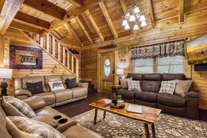 Älytelevisio, takka, videopelejä, pöytäjalkapallopöytä