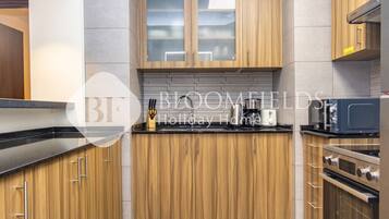 Fridge, microwave, oven, electric kettle