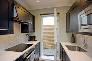 Apartamento, 1 habitación | Cocina privada | Hervidor eléctrico