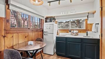 Fridge, microwave, stovetop, coffee/tea maker