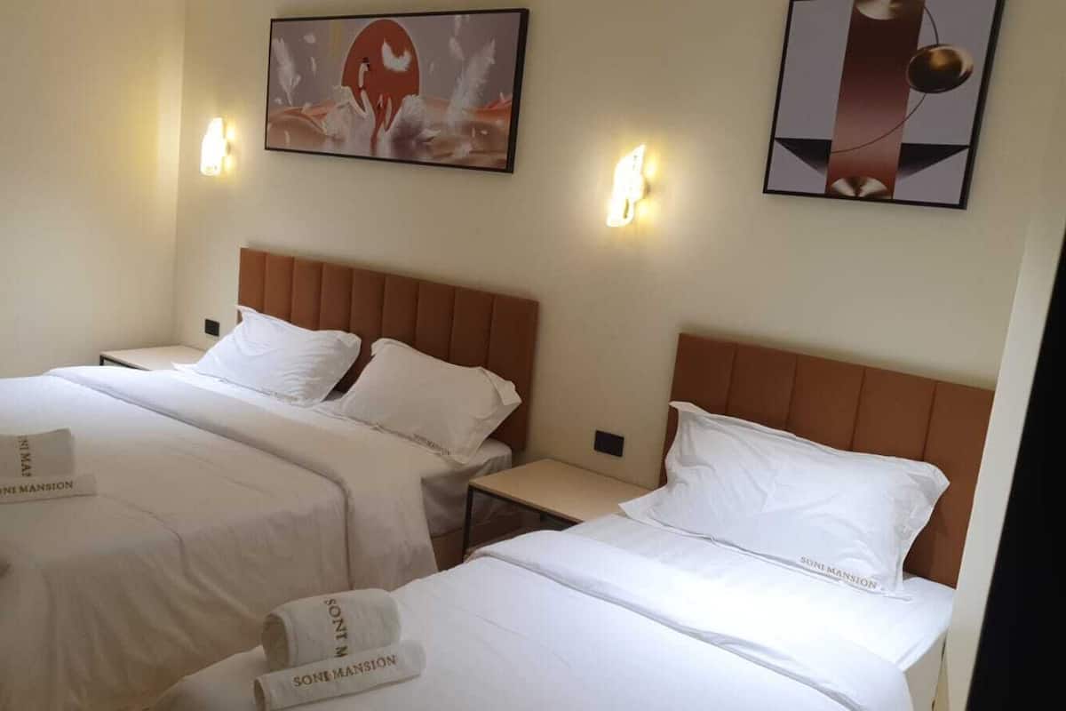 Deluxe Triple Room, City View | 1 bedroom, free WiFi, bed sheets