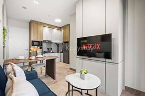Apartment, 1 Bedroom, Balcony, City View | Living area | Flat-screen TV - Havari by Kozystay - Sudirman (Jakarta)