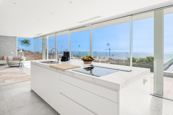 Fridge, oven, dishwasher, coffee/tea maker