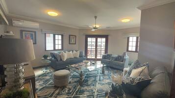 Deluxe Condo, Balcony, City View | Premium bedding, down duvets, pillow-top beds, individually decorated