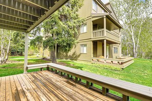 Guests can enjoy a balcony with a view, a covered porch, and a relaxing outdoor space.