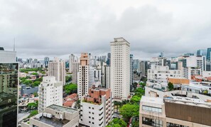 A high-rise urban area with modern buildings and a dense skyline.