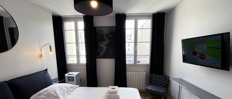 2 habitaciones, tabla de planchar con plancha y wifi gratis